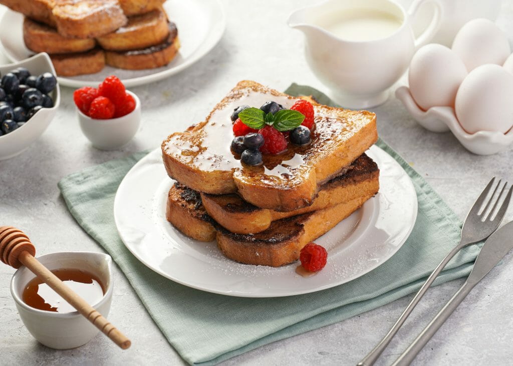 gluten-free french toast, fruit, powdered sugar
